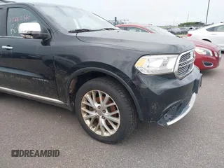 2014 Dodge Durango Citadel with VIN 1C4SDJET5EC314304, listed as a IAAI auction lot 42682540 with 213,651 mi miles and . Bid and sale history available at DreamBid. Image 6.