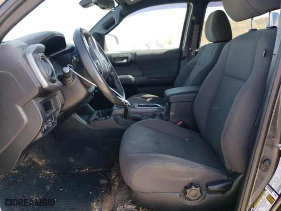 2018 Toyota Tacoma SR with VIN 3TMCZ5AN0JM139859, listed as a Copart auction lot 48006525 with 104,920 mi miles and Salvage Title. Bid and sale history available at carsss.com. Image 7.