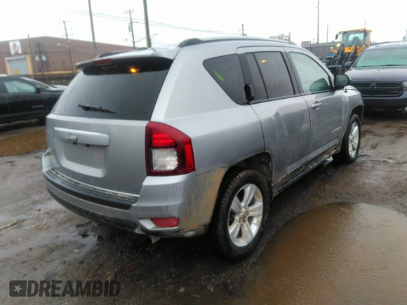 2016 Jeep Compass Sport with VIN 1C4NJDBB0GD520971, listed as a IAAI auction lot 41931731 with 124,038 mi miles and . Bid and sale history available at carsss.com. Image 4.