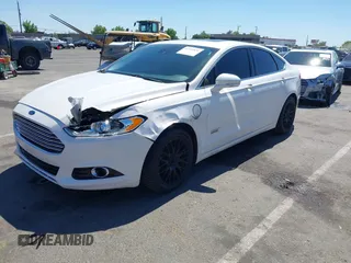 2016 Ford Fusion Titanium z VIN 3FA6P0SU2GR357508, wystawiony jako IAAI lot #42551834 z przebiegiem 177 425 mil mil oraz . Historia ofert i sprzedaży dostępna na DreamBid. Obrazek 2.