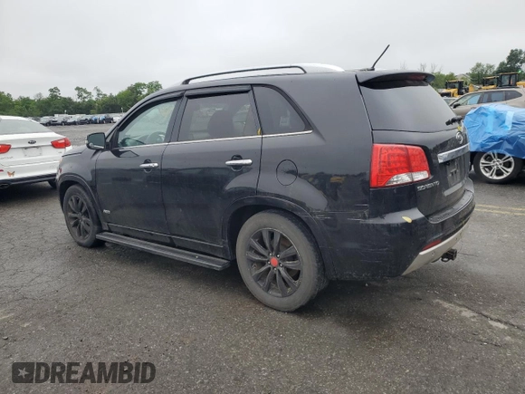 2012 Kia Sorento SX with VIN 5XYKWDA21CG213651, listed as a Copart auction lot 60831745 with 227,817 mi miles and Clean title. Bid and sale history available at DreamBid. Image 2.