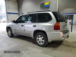 2005 GMC Envoy SLT with VIN 1GKDT13S652197929, listed as a Copart auction lot 42104855 with 228,515 mi miles and Salvage Title. Bid and sale history available at carsss.com. Image 2.