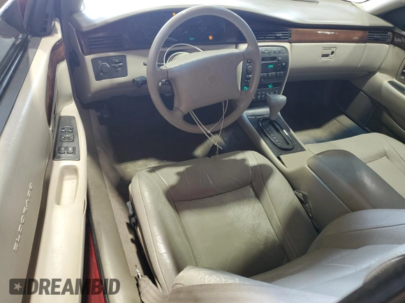 1996 Cadillac Eldorado z VIN 1G6EL12Y3TU620055, wystawiony jako Copart lot #72387994 z przebiegiem 128 641 mil mil oraz Czysty tytuł • Clean title. Historia ofert i sprzedaży dostępna na DreamBid. Obrazek 8.