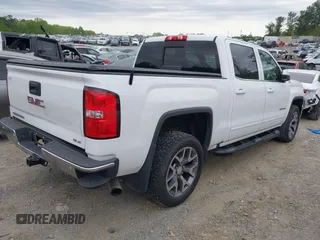 2016 GMC Sierra 1500 SLE z VIN 3GTU2MEC6GG227933, wystawiony jako IAAI lot #42026651 z przebiegiem 185 043 mil mil oraz . Historia ofert i sprzedaży dostępna na DreamBid. Obrazek 4.