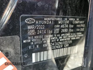 2022 Genesis G70 2.0T with VIN KMTG34TA2NU103729, listed as a Copart auction lot 65336264 with 51,705 mi miles and Salvage Title. Bid and sale history available at carsss.com. Image 12.