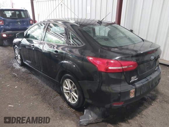 2015 Ford Focus SE with VIN 1FADP3F25FL216205, listed as a IAAI auction lot 42425478 with 124,117 mi miles and . Bid and sale history available at DreamBid. Image 3.