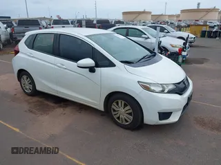 2016 Honda Fit LX z VIN JHMGK5H51GX038519, wystawiony jako IAAI lot #41809636 z przebiegiem 96 894 mil mil oraz . Historia ofert i sprzedaży dostępna na DreamBid. Obrazek 1.
