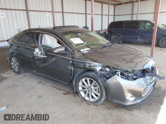 2014 Toyota Avalon Limited with VIN 4T1BK1EB0EU121139, listed as a IAAI auction lot 41987229 with 91,782 mi miles. Bid and sale history available at carsss.com. Image 1.
