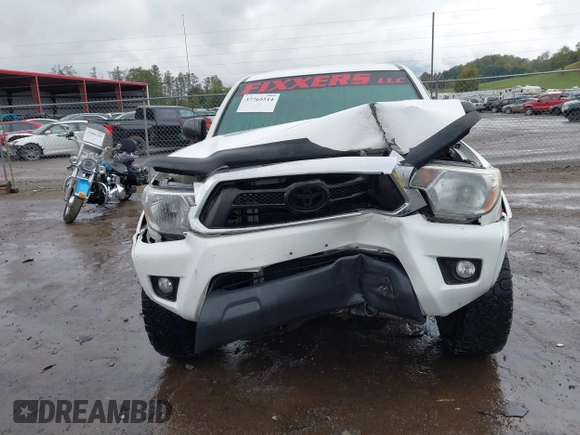 2014 Toyota Tacoma with VIN 3TMLU4EN9EM140999, listed as a IAAI auction lot 37765514 with 168,875 mi miles. Bid and sale history available at carsss.com. Image 6.