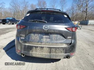 2018 Mazda CX-5 Grand Touring with VIN JM3KFBDM2J0407164, listed as a Copart auction lot 50080345 with 126,464 mi miles and Salvage title. Bid and sale history available at DreamBid. Image 6.
