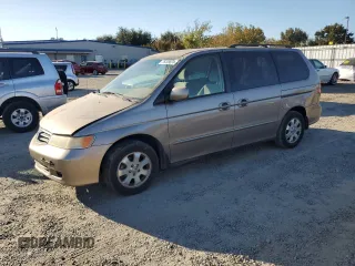 2004 Honda Odyssey EX-RES z VIN 5FNRL18894B107313, wystawiony jako Copart lot #76209524 z przebiegiem 149 993 mil mil oraz Szkoda całkowita • Salvage title. Historia ofert i sprzedaży dostępna na DreamBid. Obrazek 1.