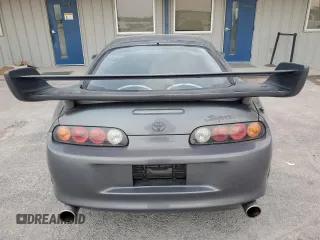 1996 Toyota Supra с VIN JZA800034162, выставлен на аукционе Copart как лот 80046394 с пробегом 86 285 миль миль и Чистый • Clean title. История ставок и продаж доступна на DreamBid. Изображение 6.