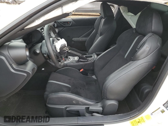 2023 Toyota GR86 Premium with VIN JF1ZNBF13P8764737, listed as a Copart auction lot 77890194 with 0 mi miles and Salvage Title. Bid and sale history available at carsss.com. Image 7.