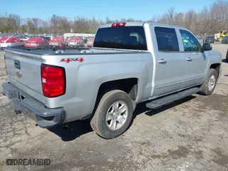 2015 Chevrolet Silverado 1500 LT with VIN 3GCUKREC4FG445820, listed as a IAAI auction lot 41844159 with 141,530 mi miles. Bid and sale history available at carsss.com. Image 4.