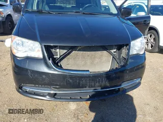 2015 Chrysler Town & Country Touring with VIN 2C4RC1BG9FR626501, listed as a IAAI auction lot 41279210 with 211,206 mi miles and . Bid and sale history available at DreamBid. Image 6.