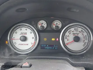 2009 Ford Focus SE with VIN 1FAHP35NX9W141890, listed as a IAAI auction lot 41709648 with 174,372 mi miles. Bid and sale history available at carsss.com. Image 7.