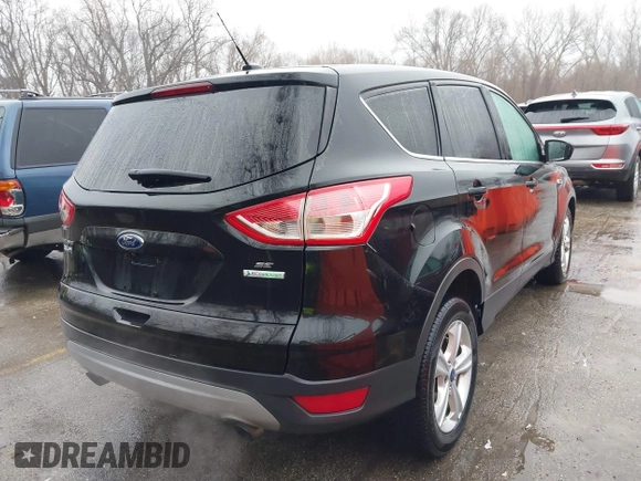 2014 Ford Escape SE with VIN 1FMCU0GX4EUE39511, listed as a IAAI auction lot 41477507 with 151,532 mi miles and . Bid and sale history available at DreamBid. Image 4.