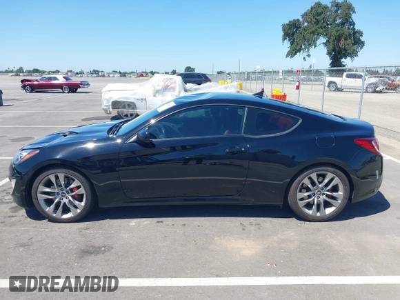 2013 Hyundai Genesis Coupe Track z VIN KMHHU6KJ6DU089065, wystawiony jako IAAI lot #42224509 z przebiegiem 104 918 mil mil oraz . Historia ofert i sprzedaży dostępna na DreamBid. Obrazek 14.