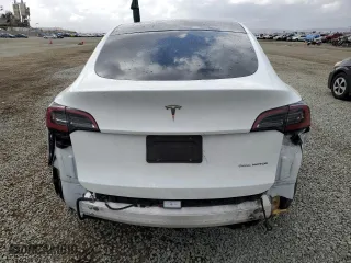 2023 Tesla Model Y Long Range with VIN 7SAYGDEE8PA069783, listed as a Copart auction lot 44635395 with 34,823 mi miles and Salvage Title. Bid and sale history available at carsss.com. Image 6.