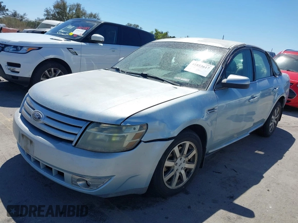 2008 Ford Taurus SEL with VIN 1FAHP24W08G174586, listed as a IAAI auction lot 41853617 with 122,016 mi miles and . Bid and sale history available at DreamBid. Image 2.