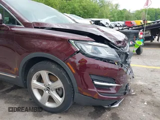 2018 Lincoln MKC Premiere z VIN 5LMCJ1C98JUL30207, wystawiony jako IAAI lot #42275853 z przebiegiem 51 206 mil mil oraz . Historia ofert i sprzedaży dostępna na DreamBid. Obrazek 20.