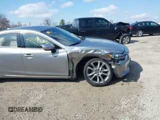 2015 Mazda 6 i Grand Touring with VIN JM1GJ1W52F1195333, listed as a IAAI auction lot 42014865 with 107,039 mi miles and . Bid and sale history available at DreamBid. Image 6.