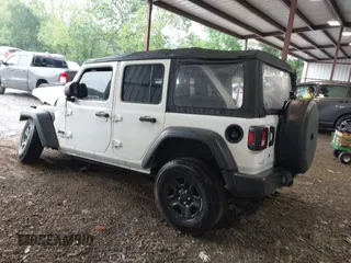 2021 Jeep Wrangler Unlimited Willys with VIN 1C4HJXDN4MW790999, listed as a IAAI auction lot 42236588 with 53,954 mi miles and . Bid and sale history available at DreamBid. Image 3.