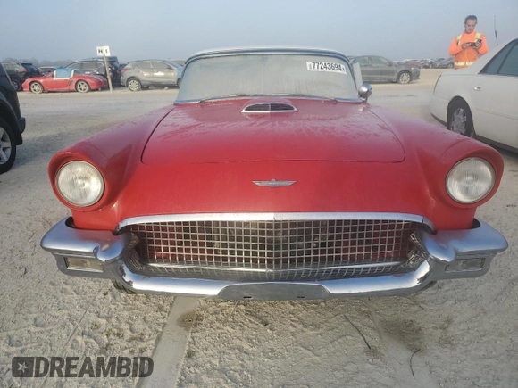 1957 Ford Thunderbird with VIN D7FH286272, listed as a Copart auction lot 77243694 with 19,878 mi miles and Salvage Title. Bid and sale history available at DreamBid. Image 5.