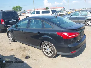 2015 Ford Focus SE z VIN 1FADP3F25FL284097, wystawiony jako IAAI lot #42553323 z przebiegiem 139 647 mil mil oraz . Historia ofert i sprzedaży dostępna na DreamBid. Obrazek 14.