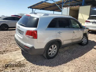 2011 Kia Sorento LX with VIN 5XYKT4A16BG049070, listed as a Copart auction lot 54437955 with 291,459 mi miles and Salvage Title. Bid and sale history available at DreamBid. Image 3.