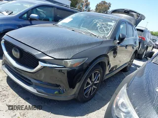 2018 Mazda CX-5 Grand Touring with VIN JM3KFADM4J0326760, listed as a IAAI auction lot 41885100 with 82,091 mi miles and . Bid and sale history available at DreamBid. Image 2.