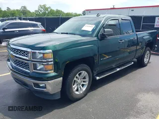 2014 Chevrolet Silverado 1500 LT with VIN 1GCRCREH2EZ323115, listed as a IAAI auction lot 42055949 with 61,337 mi miles and . Bid and sale history available at DreamBid. Image 2.