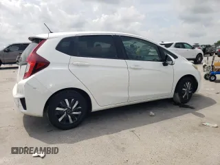 2016 Honda Fit LX with VIN JHMGK5H57GX009204, listed as a Copart auction lot 57129695 with 140,146 mi miles and Salvage title. Bid and sale history available at DreamBid. Image 3.