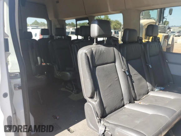 2019 Ford Transit Passenger XL with VIN 1FBVU4XMXKKB26565, listed as a Copart auction lot 70501504 with 82,291 mi miles and Salvage Title. Bid and sale history available at DreamBid. Image 11.