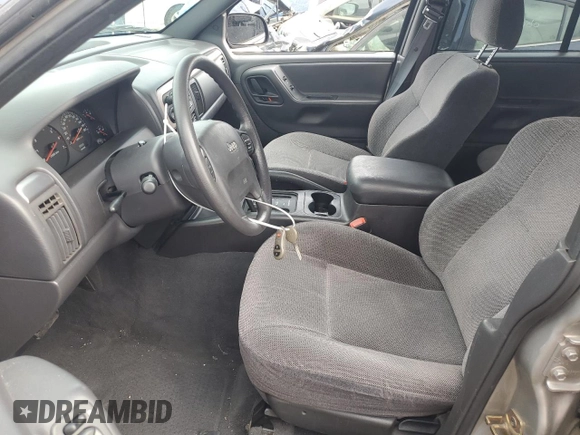 2001 Jeep Grand Cherokee Laredo with VIN 1J4GW48S91C580921, listed as a Copart auction lot 59005625 with 163,827 mi miles and Salvage title. Bid and sale history available at DreamBid. Image 7.