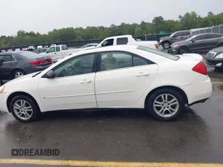 2006 Pontiac G6 6-Cyl z VIN 1G2ZG558364172091, wystawiony jako IAAI lot #42377332 z przebiegiem 199 495 mil mil oraz . Historia ofert i sprzedaży dostępna na DreamBid. Obrazek 14.