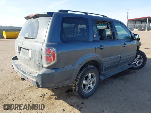 2006 Honda Pilot EX-L with VIN 5FNYF18656B012252, listed as a IAAI auction lot 41801738 with 246,191 mi miles and . Bid and sale history available at DreamBid. Image 4.