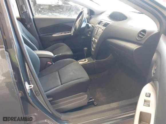 2010 Toyota Yaris with VIN JTDBT4K38A1355010, listed as a IAAI auction lot 41563391 with 154,835 mi miles. Bid and sale history available at carsss.com. Image 5.