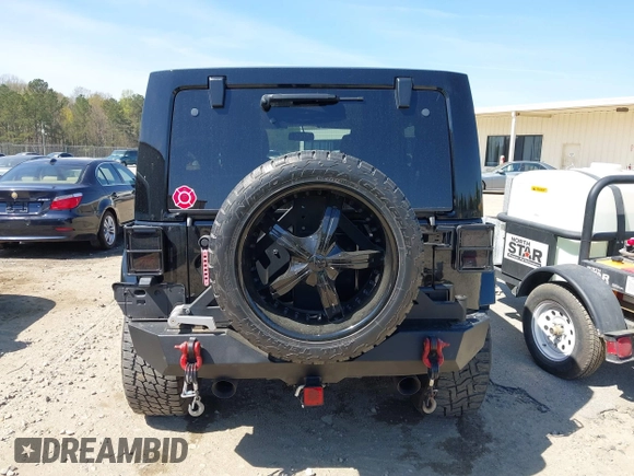 2014 Jeep Wrangler Unlimited Sahara with VIN 1C4BJWEG1EL258242, listed as a IAAI auction lot 41894966 with 90,234 mi miles. Bid and sale history available at carsss.com. Image 16.