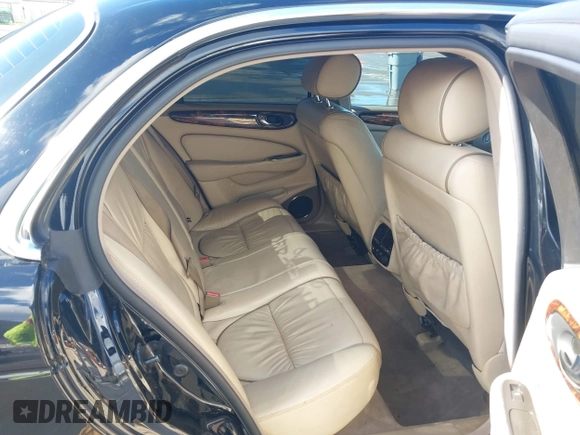 2004 Jaguar XJ with VIN SAJEA74C94SG11224, listed as a IAAI auction lot 41732975 with 204,815 mi miles and . Bid and sale history available at DreamBid. Image 8.