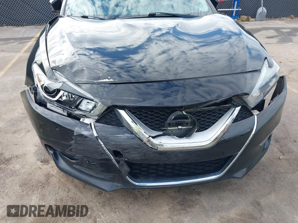 2016 Nissan Maxima SL with VIN 1N4AA6AP3GC426067, listed as a IAAI auction lot 41680265 with 102,450 mi miles and . Bid and sale history available at DreamBid. Image 6.