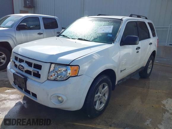 2011 Ford Escape Hybrid with VIN 1FMCU4K3XBKA75758, listed as a IAAI auction lot 42753145 with 170,554 mi miles and . Bid and sale history available at DreamBid. Image 2.