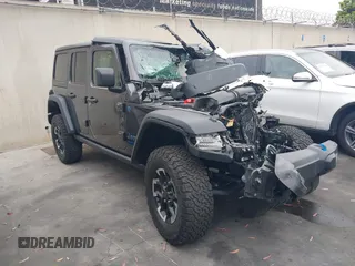 2024 Jeep Wrangler Rubicon with VIN 1C4RJXR66RW255542, listed as a IAAI auction lot 42444398 with Not provided miles and . Bid and sale history available at DreamBid. Image 1.