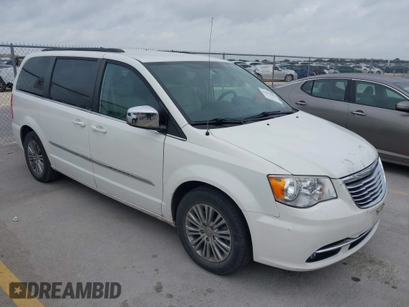 2013 Chrysler Town & Country Touring-L with VIN 2C4RC1CG2DR508799, listed as a IAAI auction lot 42092504 with 140,775 mi miles. Bid and sale history available at carsss.com. Image 1.