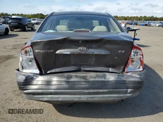 2006 Kia Spectra EX with VIN KNAFE122X65270684, listed as a Copart auction lot 73002454 with 79,326 mi miles and Salvage Title. Bid and sale history available at carsss.com. Image 6.
