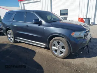 2014 Dodge Durango Limited z VIN 1C4RDJDG1EC477471, wystawiony jako IAAI lot #41650973 z przebiegiem 207 775 mil mil oraz . Historia ofert i sprzedaży dostępna na DreamBid. Obrazek 1.