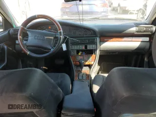 1997 Audi A6 z VIN WAUGA84A4VN006453, wystawiony jako Copart lot #47408094 z przebiegiem 333 651 mil mil oraz Szkody całkowita. Historia ofert i sprzedaży dostępna na DreamBid. Obrazek 8.