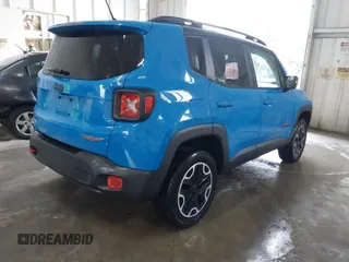 2015 Jeep Renegade Trailhawk with VIN ZACCJBCT0FPB59264, listed as a IAAI auction lot 42203406 with 109,000 mi miles and . Bid and sale history available at DreamBid. Image 4.