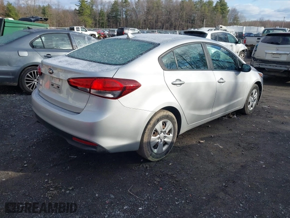 2018 Kia Forte LX with VIN 3KPFK4A74JE167784, listed as a IAAI auction lot 41969966 with 76,521 mi miles. Bid and sale history available at carsss.com. Image 4.