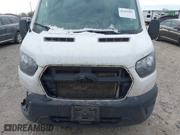 2020 Ford Transit Cargo with VIN 1FTBR3X81LKB42992, listed as a IAAI auction lot 41363461 with 206,522 mi miles and . Bid and sale history available at carsss.com. Image 6.